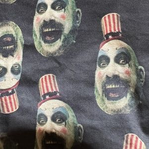 Captain Spaulding tie-crop top